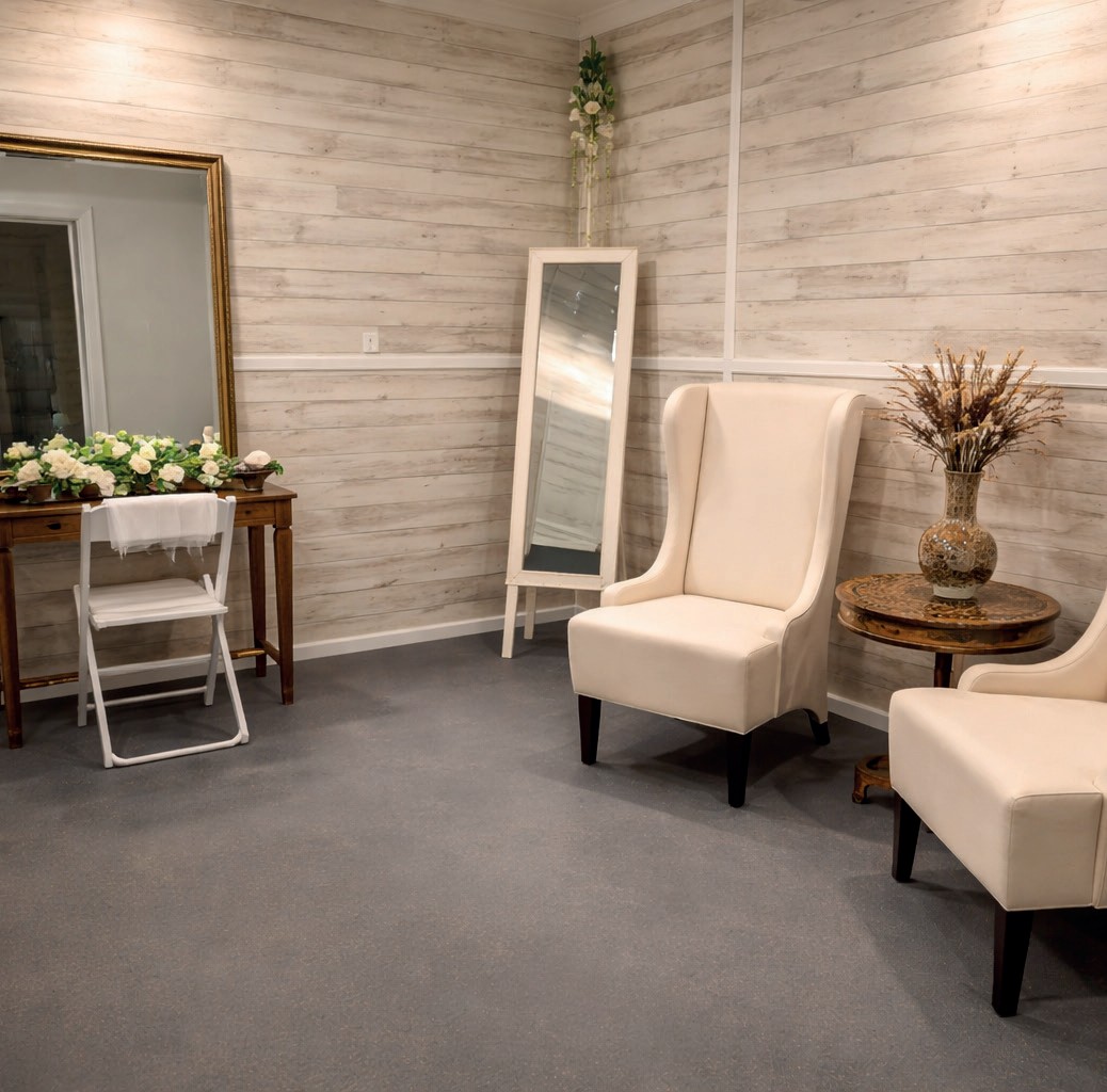 Private bridal suite with vanity, mirrors and seating